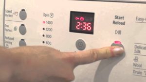 Unlocking the washing machine using the control panel