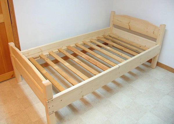 Making a double bed from wood.