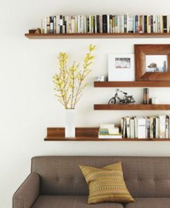 Bookshelves behind the sofa