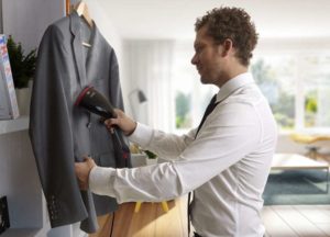 Steaming clothes with a steam cleaner