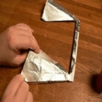 Glue foil onto the vibrator structure