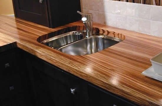 Fastening the countertop in the kitchen set