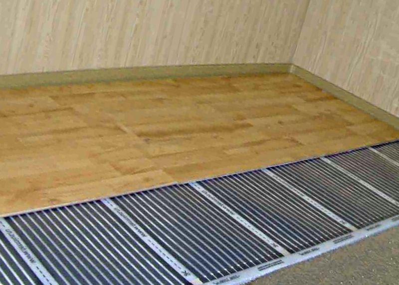 Laminate for heated floors