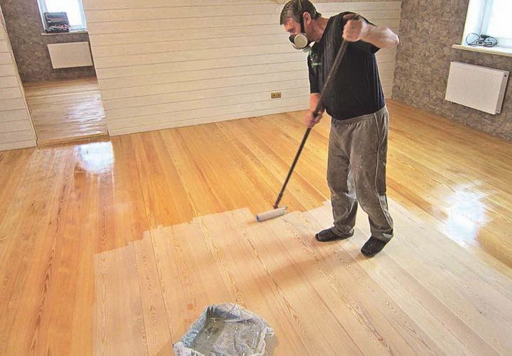 Waxing of laminate flooring.