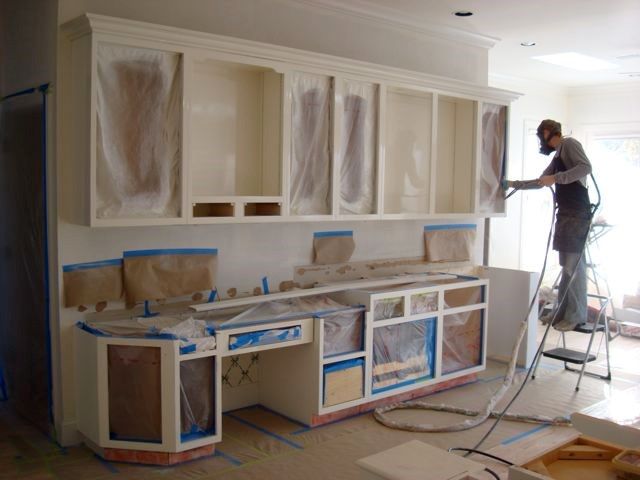 Restoration work on kitchen furniture.