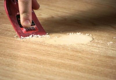 Remove super glue from linoleum