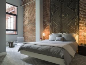 Wall textiles fit into a loft-style room