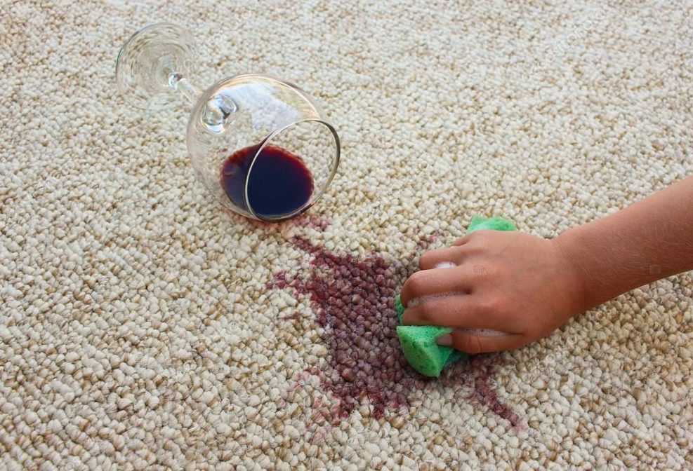 Cleaning wine from carpet.