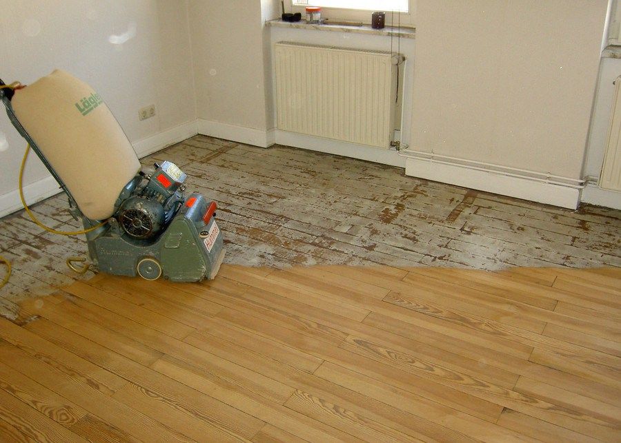 Scraping a wood floor