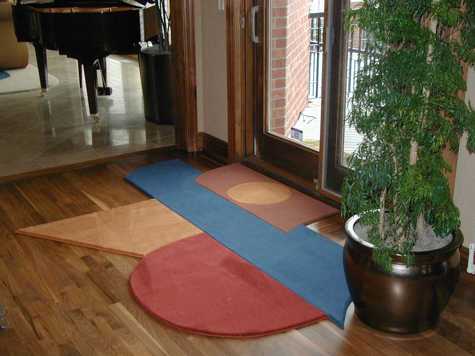 Carpet in the corridor of an unusual shape.