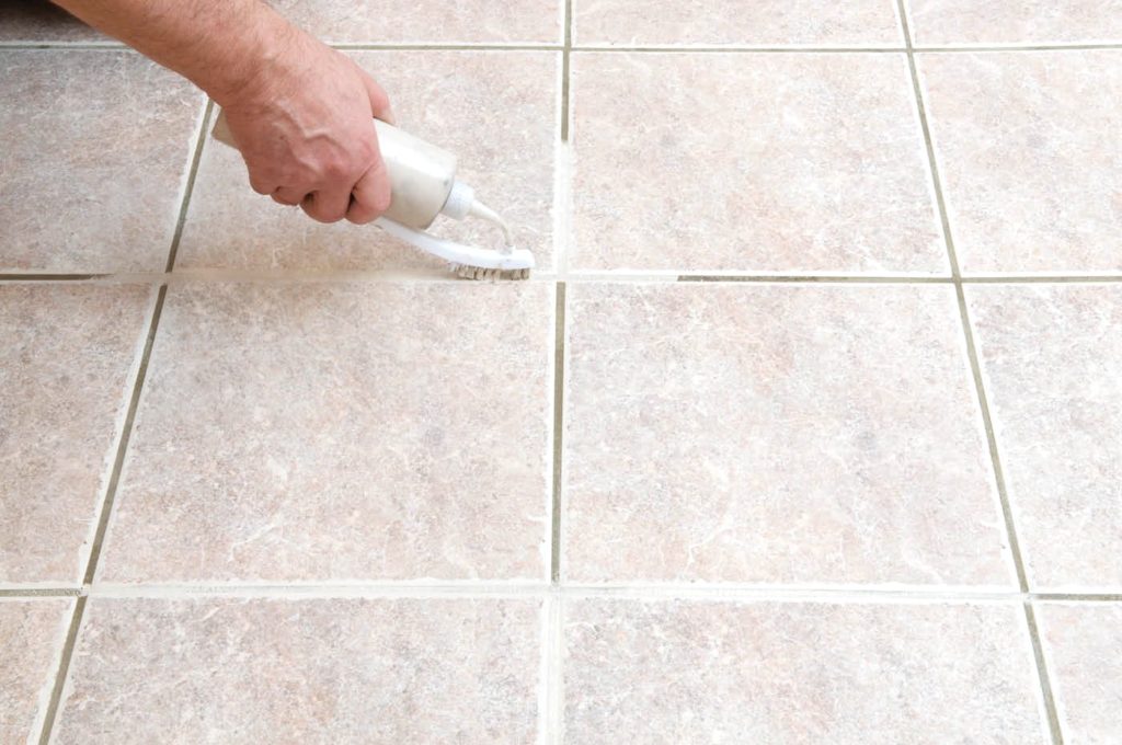 Methods for cleaning between tile joints 