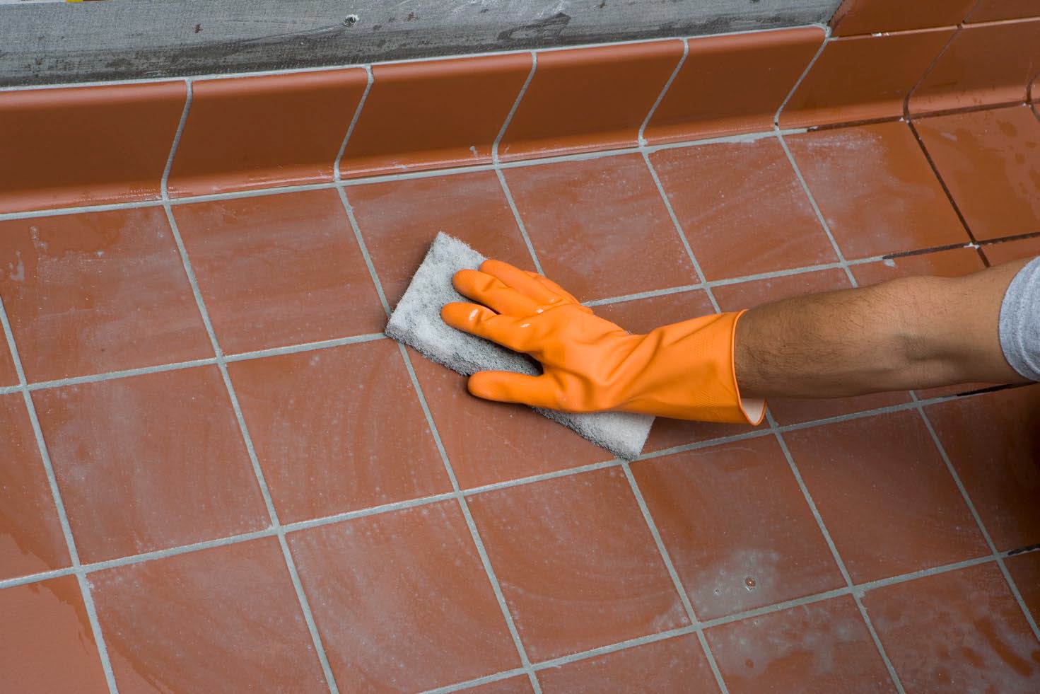 Methods for cleaning between tile joints