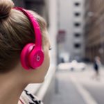 Girl-in-wireless-headphones-1024×576