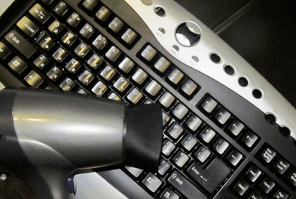 Hairdryer for cleaning the keyboard.