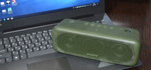 Bluetooth speaker and laptop.