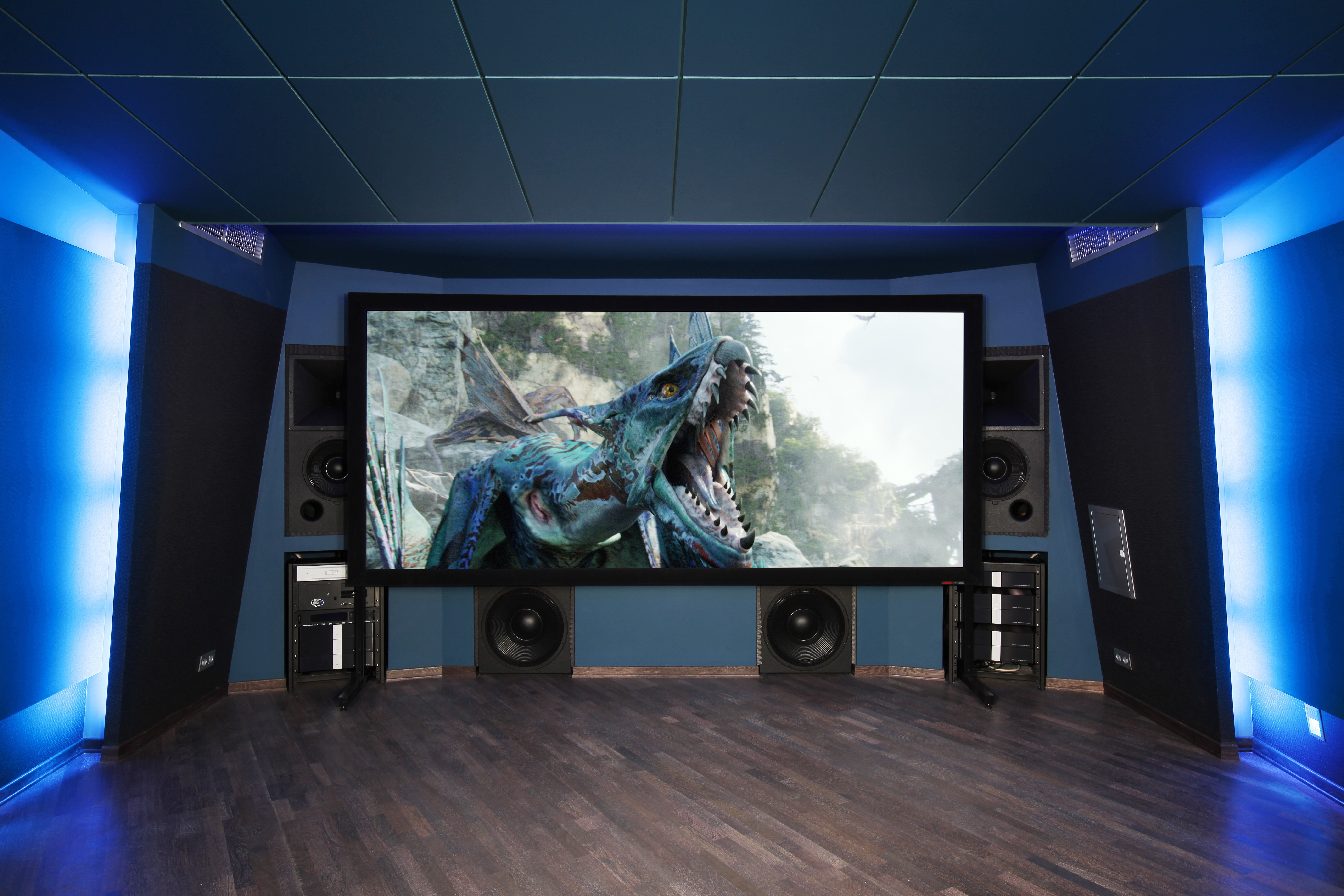 Home theater with subwoofer in a large room.