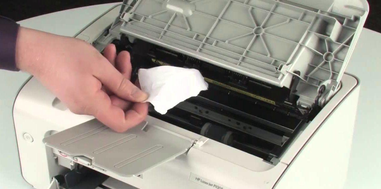 Removing paper from the printer.