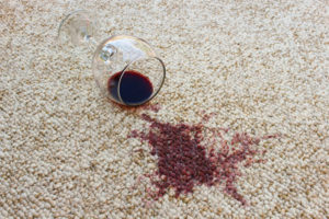 43929743 – glass of red wine fell on carpet, wine spilled on carpet