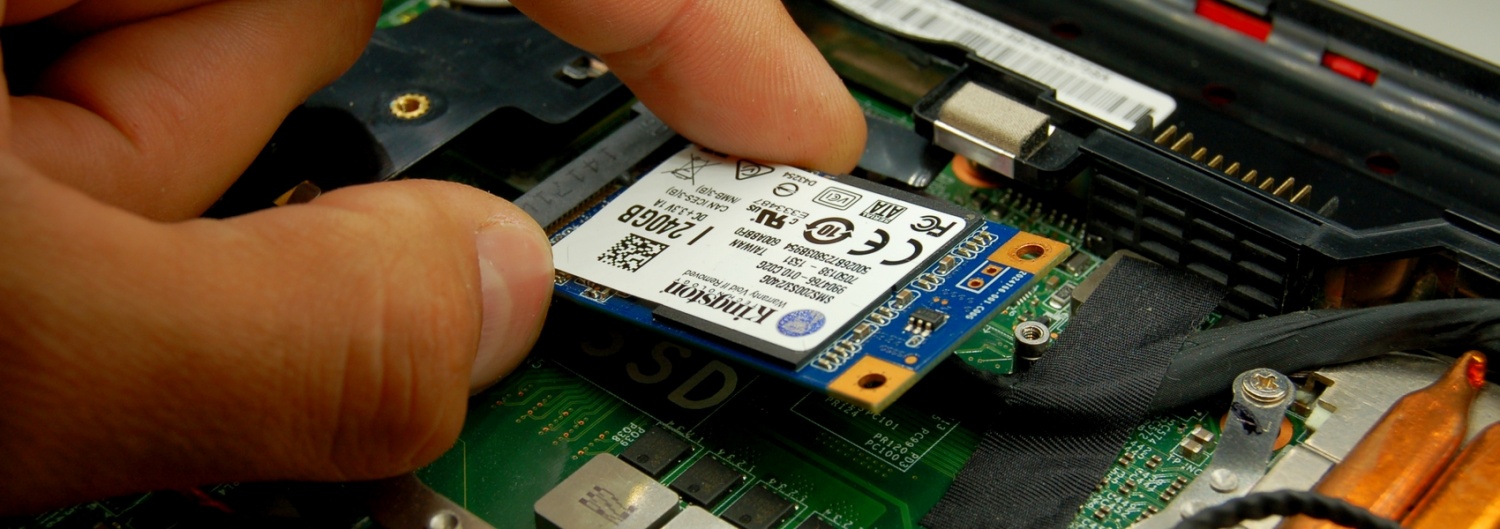 Installing an SSD in a laptop.