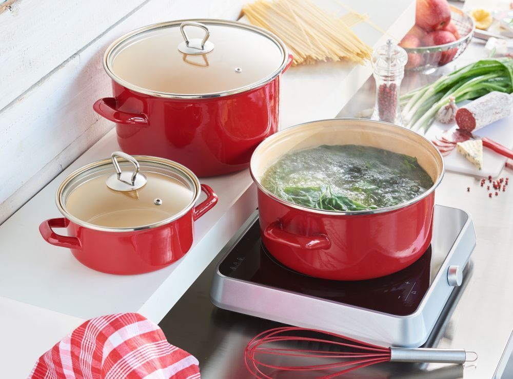 Cooking in an enamel pan.