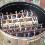 Fish in a smokehouse from a washing machine.