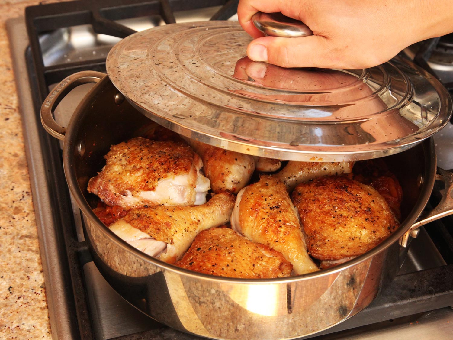 Frying meat in a pan.