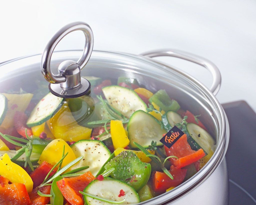 Stainless steel pan with food.