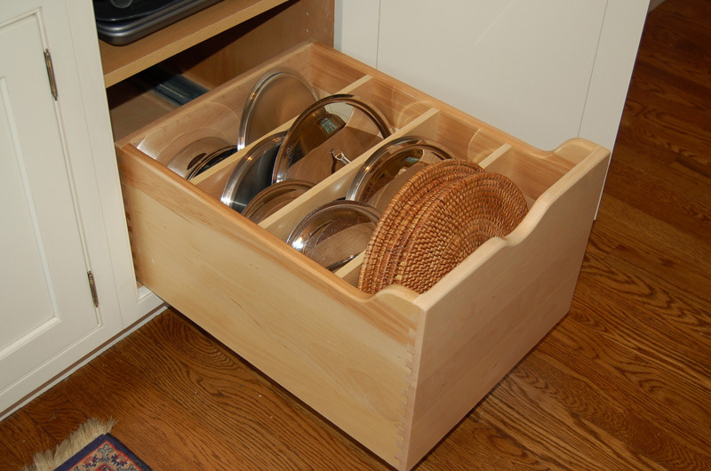 Lids in the compartments of the box.