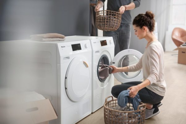 What happens if you load more laundry into the washing machine?