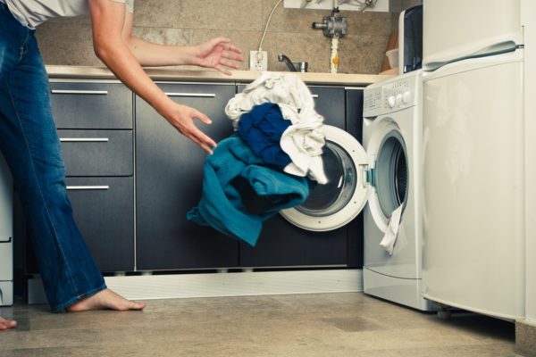 What happens if you load more laundry into the washing machine?