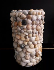 vase covered with shells