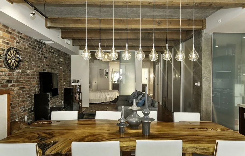 loft style chandelier above the dining table