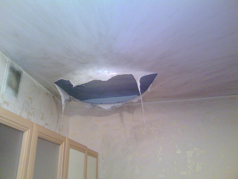 torn stretch ceiling due to low temperatures