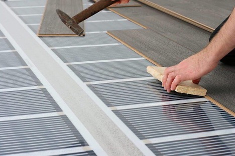 Infrared heated floor installation